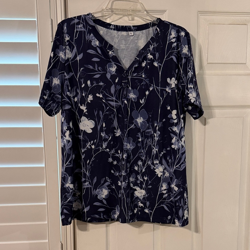 Navy blue short sleeve floral top, never worn